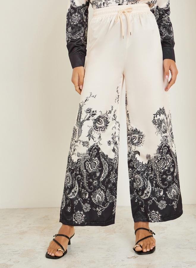 Styli Women Beige Wide Leg Paisley Print Trousers - Image 1